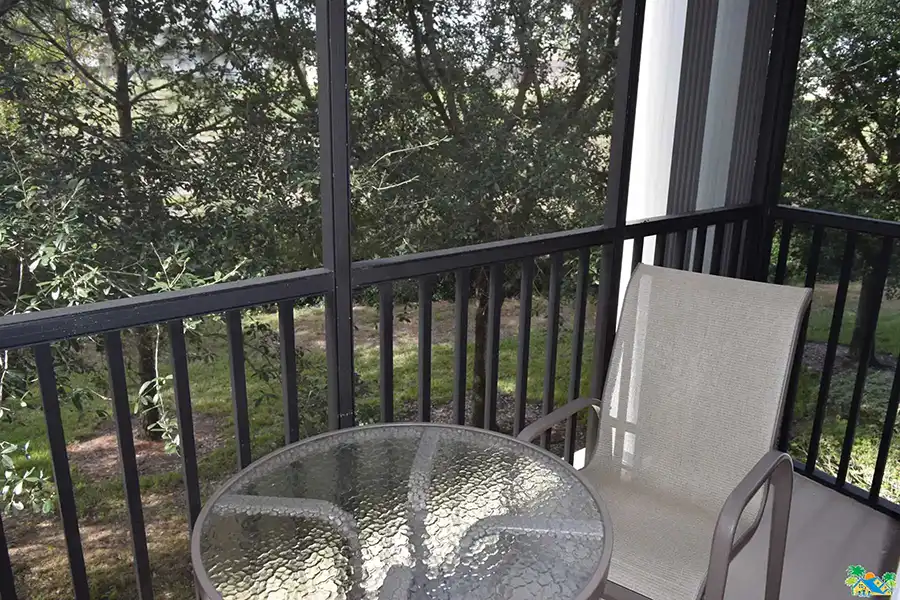 One of the two screened balconies in the condo with views over the conservation area