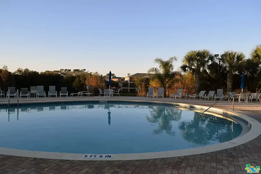 A further view of the clubhouse pool in the evening